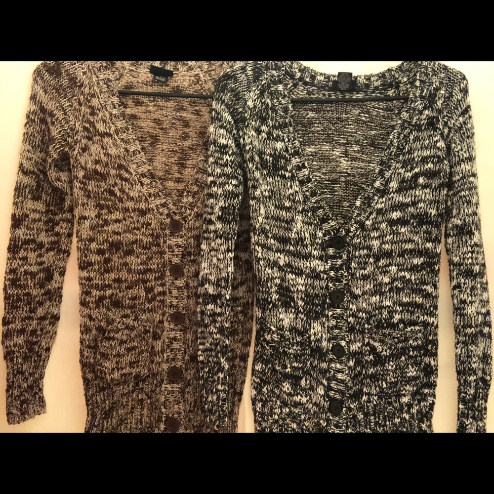 Black/white and brown/white long sleeve sweater.